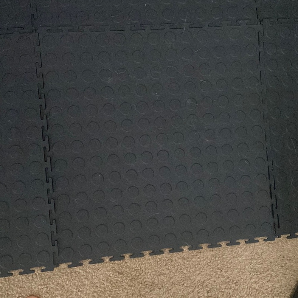 About 18x18 inch square garage tile